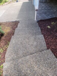 Spring concrete cleaning on a Washington driveway