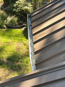 Spring gutter cleaning on a Washington home